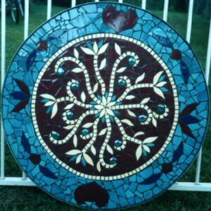 Indian flower mosaic table in blue, burgundy and yellow colourings