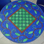 chess table in mosaic with vines and leaves