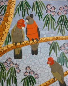 Mosaic depiction of 3 native gang gangs birds in a flowering gum tree