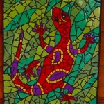 surreal mosaic gecko against coloured green background