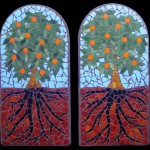 growth mosaic candleholder representing fruiting citrus tree and roots in the ground