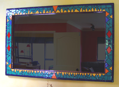 mosaic mirror inspired by aztec colours and design