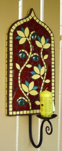 Indian flowers mosaic design in burgundy and yellow as a candleholder