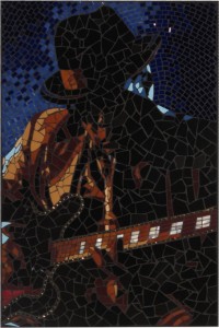 mural representing John lee hooker the blues performer on guitar