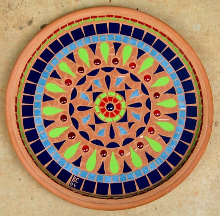 ceramic mosaic arranged as a kaleidoscope