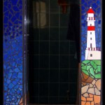 Mosaic mirror inspired by a lighthouse scene