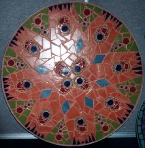 Mosaic tabletop inspired by peacock feathers