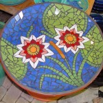 Mosaic birdbath in ceramic with Lillies, lillypads and reeds