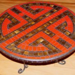 roundshou design in ceramic mosaic in red