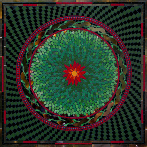 springburst mosaic mandala bright green leaves around a sun centre surrounded by a Celtic style border