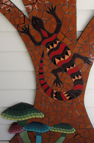 outdoor mosaic wall wisdom tree goanna mushrooms