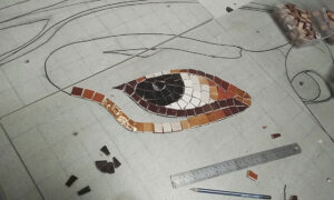 Mosaic eye as the starting point for a large mosaic mural
