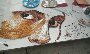 Eyes and nose completed on the commemorative mosaic artwork