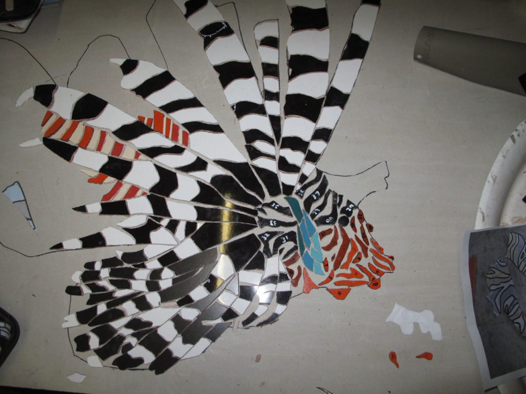 lionfish mosaic pieces cut ready for laying